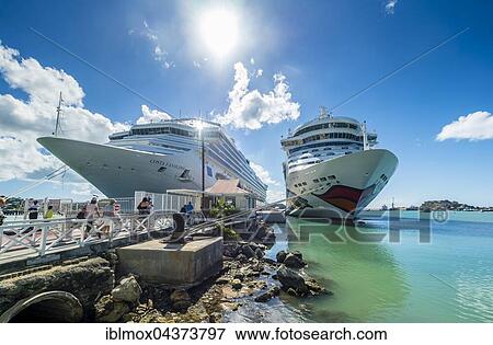 Cruise ships, AIDADIVA and Costa Favolosa in Port Antigua, West Indies, Antigua, Antigua and Barbuda, Central America View Large Photo Image Stock Photo - Cruise ships, AIDADIVA and Costa Favolosa in Port Antigua, West Indies, Antigua, Antigua and Barbuda, Central America. Fotosearch