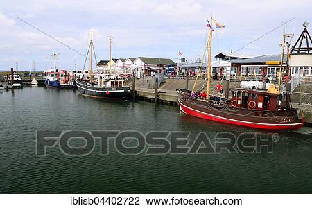 cutter, excursion boat with tourists in the port of List, Sylt, North Frisian Islands, North Frisia, Schleswig-Holstein, Germany, Europe View Large Photo Image Stock Image - cutter, excursion boat with tourists in the port of List, Sylt, North Frisian Islands, North Frisia, Schleswig-Holstein, Germany, Europe. Fotosearch