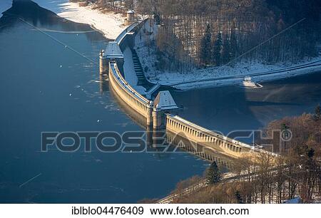 Dam Möhnesee in the evening light, winter weather, low water at Möhnesee, Sauerland, North Rhine-Westphalia, Germany, Europe View Large Photo Image Stock Photo - Dam Möhnesee in the evening light, winter weather, low water at Möhnesee, Sauerland, North Rhine-Westphalia, Germany, Europe. Fotosearch