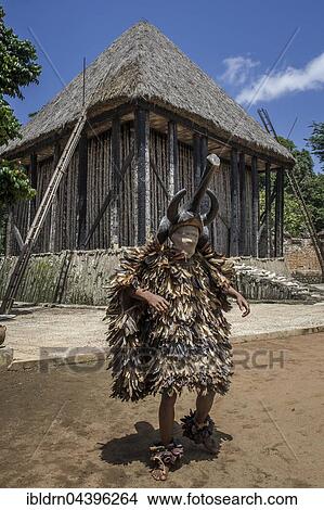Dancer in traditional clothing wearing carved mask, Atchum, Fon's Palace, Bafut, Bamenda, North-West Region, Cameroon, Africa View Large Photo Image Picture - Dancer in traditional clothing wearing carved mask, Atchum, Fon's Palace, Bafut, Bamenda, North-West Region, Cameroon, Africa. Fotosearch