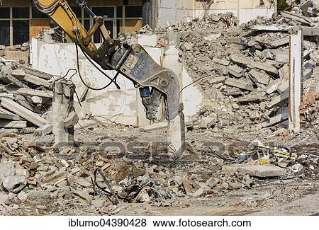 Stock Photo - Demolition work, excavator with rubble, Dresden, Germany, Europe. Fotosearch