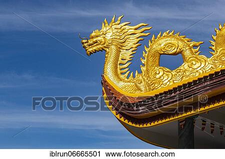 Stock Image - Detail of dragons on the ceiling at the Ho Quoc Pagoda Buddhist temple, island of Phu Quoc, Vietnam, Asia. Fotosearch
