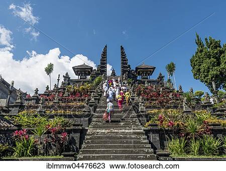 Devout Balinese descend stairs, split gate, Candi bentar, mother temple Besakih, Pura Agung Besakih Penetaran, Banjar Besakih, Bali, Indonesia, Asia View Large Photo Image Stock Image - Devout Balinese descend stairs, split gate, Candi bentar, mother temple Besakih, Pura Agung Besakih Penetaran, Banjar Besakih, Bali, Indonesia, Asia. Fotosearch