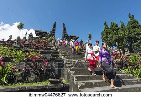 Devout Balinese descend stairs, split gate, Candi bentar, mother temple Besakih, Pura Agung Besakih Penetaran, Banjar Besakih, Bali, Indonesia, Asia View Large Photo Image Stock Photo - Devout Balinese descend stairs, split gate, Candi bentar, mother temple Besakih, Pura Agung Besakih Penetaran, Banjar Besakih, Bali, Indonesia, Asia. Fotosearch