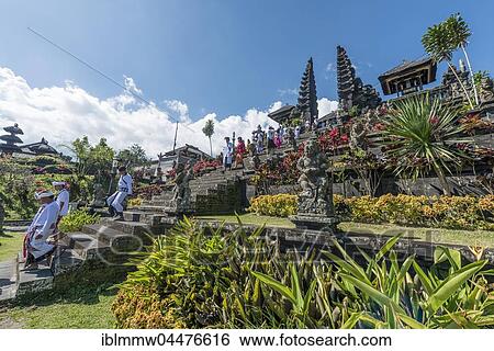 Devout Balinese descend stairs, split gate, Candi bentar, mother temple Besakih, Pura Agung Besakih Penetaran, Banjar Besakih, Bali, Indonesia, Asia View Large Photo Image Stock Photograph - Devout Balinese descend stairs, split gate, Candi bentar, mother temple Besakih, Pura Agung Besakih Penetaran, Banjar Besakih, Bali, Indonesia, Asia. Fotosearch