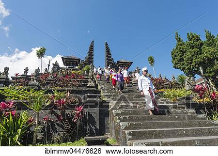 Devout Balinese descend stairs, split gate, Candi bentar, mother temple Besakih, Pura Agung Besakih Penetaran, Banjar Besakih, Bali, Indonesia, Asia View Large Photo Image Stock Photograph - Devout Balinese descend stairs, split gate, Candi bentar, mother temple Besakih, Pura Agung Besakih Penetaran, Banjar Besakih, Bali, Indonesia, Asia. Fotosearch