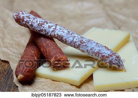 Stock Image - Different kinds of sausages and cheese slices. Fotosearch