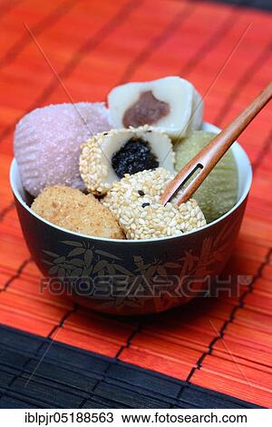 Different Mochi in bowl, Japanese sticky rice cake, Asian confectionery speciality, filled View Large Photo Image Stock Image - Different Mochi in bowl, Japanese sticky rice cake, Asian confectionery speciality, filled. Fotosearch