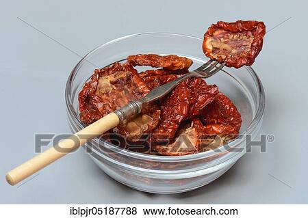 Stock Photo - Dried tomatoes, Solanum lycopersicum. Fotosearch
