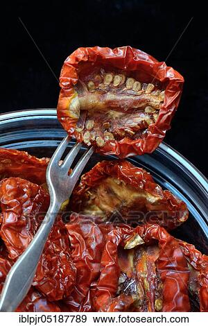 Stock Photo - Dried tomatoes, Solanum lycopersicum. Fotosearch