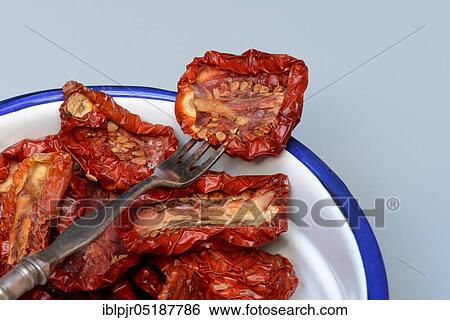 Stock Photograph - Dried tomatoes, Solanum lycopersicum. Fotosearch