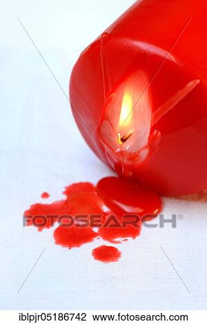 Dropped, burning candle on fabric View Large Photo Image Stock Image - Dropped, burning candle on fabric. Fotosearch