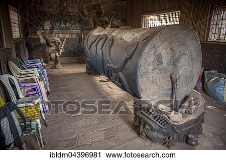 Stock Image - Drum from a tree trunk in a Tam-Tam House, Foumbam, West Region, Cameroon, Africa. Fotosearch