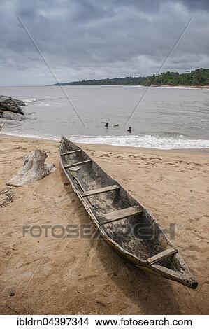 Dugout canoe on the beach, Ebodjé, Southern Region, Cameroon, Africa View Large Photo Image Picture - Dugout canoe on the beach, Ebodjé, Southern Region, Cameroon, Africa. Fotosearch