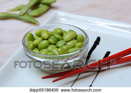 Edamame, cooked unripe Soya beans (Glycine max) in a bowl View Large Photo Image Stock Photo - Edamame, cooked unripe Soya beans (Glycine max) in a bowl. Fotosearch