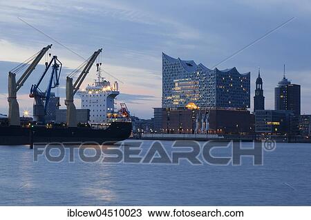 Elbe Philharmonic Hall with Michel and port cranes, Sunset, HafenCity, Hamburg, Germany, Europe View Large Photo Image Stock Image - Elbe Philharmonic Hall with Michel and port cranes, Sunset, HafenCity, Hamburg, Germany, Europe. Fotosearch