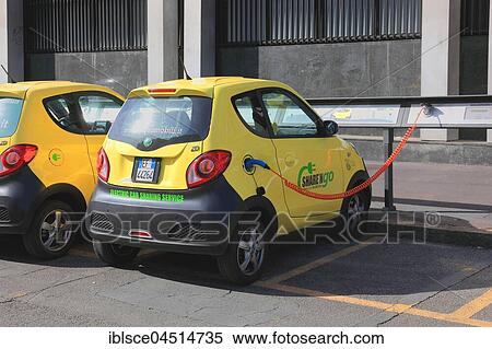 Electric cars, electric cars at the charging station with charging cable, Milan, Italy, Europe View Large Photo Image Stock Photography - Electric cars, electric cars at the charging station with charging cable, Milan, Italy, Europe. Fotosearch