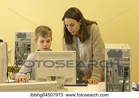 Elementary school student working in computer room, Lower Saxony, Germany, Europe View Large Photo Image Stock Image - Elementary school student working in computer room, Lower Saxony, Germany, Europe. Fotosearch