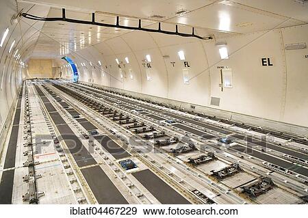 Stock Photo - Empty cargo compartment, cargo plane, Boeing B 747. Fotosearch