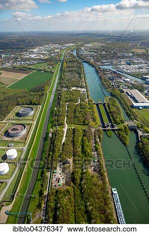 Emscher and lock Rhine-Herne Canal, Wild Island, Emscher Island, Gelsenkirchen, Ruhr district, North Rhine-Westphalia, Germany, Europe View Large Photo Image Stock Photo - Emscher and lock Rhine-Herne Canal, Wild Island, Emscher Island, Gelsenkirchen, Ruhr district, North Rhine-Westphalia, Germany, Europe. Fotosearch