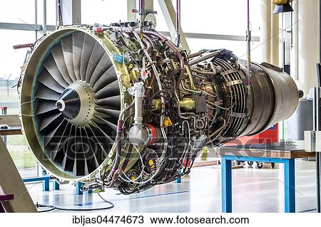Engine's maintenance in huge industrial hall, airport Shipol, Amsterdam, The Netherlands, Europe View Large Photo Image Stock Image - Engine's maintenance in huge industrial hall, airport Shipol, Amsterdam, The Netherlands, Europe. Fotosearch