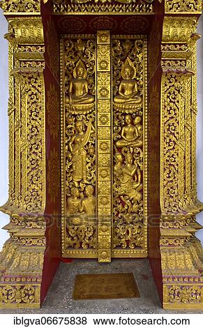 Entrance portal with gilded carvings, mythological mythical creatures and scenes from the life of Buddha, temple Wat Nong Sikhounmuang, Luang Prabang, Laos, Asia View Large Photo Image Stock Photo - Entrance portal with gilded carvings, mythological mythical creatures and scenes from the life of Buddha, temple Wat Nong Sikhounmuang, Luang Prabang, Laos, Asia. Fotosearch