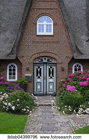 Entrance, traditional old Frisian house, thatched house, Keitum, Sylt, North Frisian Islands, North Frisia, Schleswig-Holstein, Germany, Europe View Large Photo Image Stock Photograph - Entrance, traditional old Frisian house, thatched house, Keitum, Sylt, North Frisian Islands, North Frisia, Schleswig-Holstein, Germany, Europe. Fotosearch