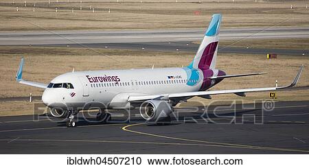 Euro Wings Airbus A 320-214 on Runway, Düsseldorf Airport, Düsseldorf, North Rhine-Westphalia, Germany, Europe View Large Photo Image Stock Image - Euro Wings Airbus A 320-214 on Runway, Düsseldorf Airport, Düsseldorf, North Rhine-Westphalia, Germany, Europe. Fotosearch