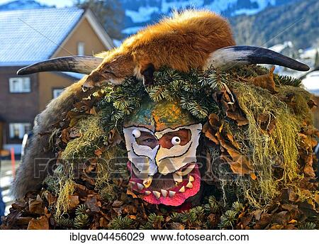 Stock Photo - Eve Klaus, Silvesterchlaus, man adorned with mask and costume, tradition at the Old New Year, Urnäsch, Appenzell Ausserrhoden, Switzerland, Europe. Fotosearch