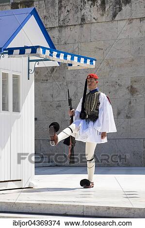 Evzone in front of the Tomb of the Unknown Soldier, in front of Parliament on Syntagma Square, Athens, Greece, Europe View Large Photo Image Picture - Evzone in front of the Tomb of the Unknown Soldier, in front of Parliament on Syntagma Square, Athens, Greece, Europe. Fotosearch