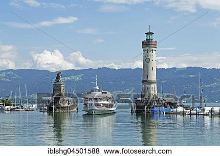 Excursion ship in harbor entrance, harbor, Lindau, Lake Constance, Bavaria, Deutchland View Large Photo Image Stock Photo - Excursion ship in harbor entrance, harbor, Lindau, Lake Constance, Bavaria, Deutchland. Fotosearch
