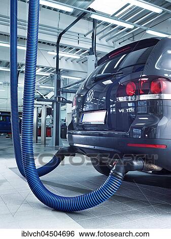 Exhaust emission measurement on car in a VW garage, Austria, Europe View Large Photo Image Stock Photograph - Exhaust emission measurement on car in a VW garage, Austria, Europe. Fotosearch