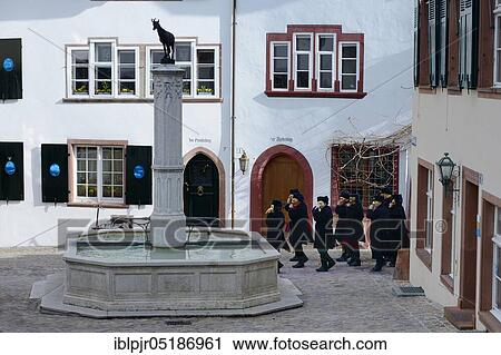 Fasnacht group with flutes at Gemberg, piccolos, Gemsberg fountain, old town of Basel, Switzerland, Europe View Large Photo Image Stock Image - Fasnacht group with flutes at Gemberg, piccolos, Gemsberg fountain, old town of Basel, Switzerland, Europe. Fotosearch