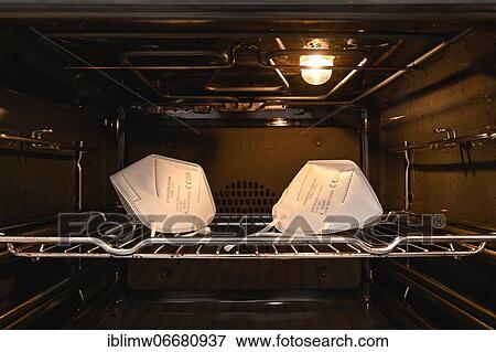 FFP2 masks are reprocessed in the oven at 80°C top and bottom heat, Corona crisis, Stuttgart, Baden-Württemberg, Germany, Europe View Large Photo Image Stock Photo - FFP2 masks are reprocessed in the oven at 80°C top and bottom heat, Corona crisis, Stuttgart, Baden-Württemberg, Germany, Europe. Fotosearch