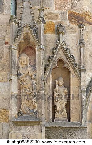 Stock Image - Figures on the outer wall, High Cathedral, Hildesheim, Lower Saxony, Germany, Europe. Fotosearch