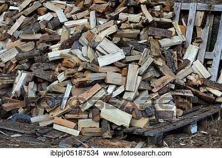 Picture - Firewood, wood, logs, logs, split, split, firewood pile. Fotosearch