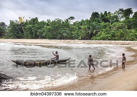 Fisherman and children with dugout canoe on the beach, Ebodjé, Southern Region, Cameroon, Africa View Large Photo Image Stock Photograph - Fisherman and children with dugout canoe on the beach, Ebodjé, Southern Region, Cameroon, Africa. Fotosearch