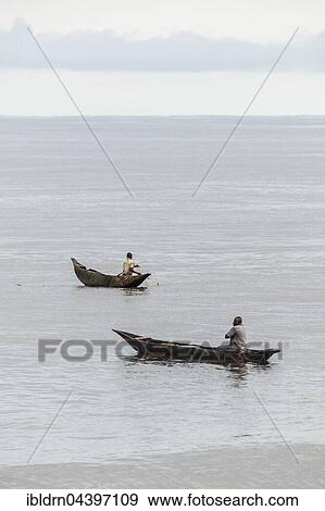 Fisherman in dugout canoes, Kribi, South Region, Cameroon, Africa View Large Photo Image Stock Photo - Fisherman in dugout canoes, Kribi, South Region, Cameroon, Africa. Fotosearch