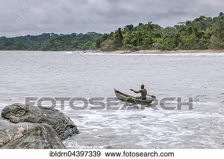Fisherman with dugout canoe on the beach, Ebodjé, Southern Region, Cameroon, Africa View Large Photo Image Stock Photo - Fisherman with dugout canoe on the beach, Ebodjé, Southern Region, Cameroon, Africa. Fotosearch