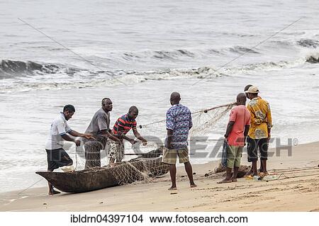 Fishermen prepare a net for fishing, Kribi, South Region, Cameroon, Africa View Large Photo Image Picture - Fishermen prepare a net for fishing, Kribi, South Region, Cameroon, Africa. Fotosearch