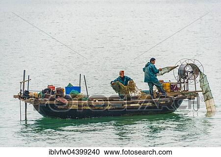 Fishing Boat, Halong Bay, Gulf of Tonkin, North Vietnam, Vietnam, Asia View Large Photo Image Stock Image - Fishing Boat, Halong Bay, Gulf of Tonkin, North Vietnam, Vietnam, Asia. Fotosearch
