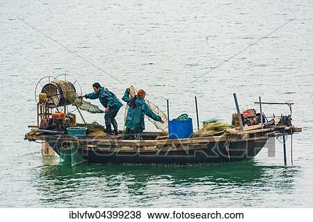 Fishing Boat, Halong Bay, Gulf of Tonkin, North Vietnam, Vietnam, Asia View Large Photo Image Stock Photo - Fishing Boat, Halong Bay, Gulf of Tonkin, North Vietnam, Vietnam, Asia. Fotosearch