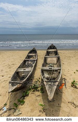 Fishing boats on the beach of Kribi, Cameroon, Africa View Large Photo Image Stock Image - Fishing boats on the beach of Kribi, Cameroon, Africa. Fotosearch