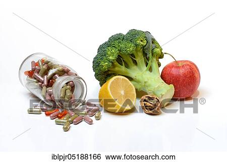 Stock Photograph - Food supplement, capsules in bottle, Omega-3 fatty acids, vitamins, fish oil capsule, pharmacy bottle. Fotosearch