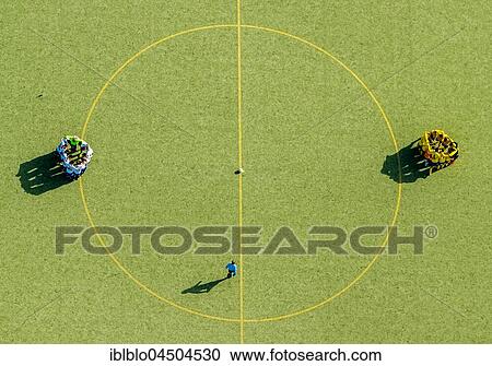 Football players at the center circle, game preparation, team buildatg, Huddle, Football Field, North Rhate-Westphalia, Germany, Europe View Large Photo Image Stock Image - Football players at the center circle, game preparation, team buildatg, Huddle, Football Field, North Rhate-Westphalia, Germany, Europe. Fotosearch