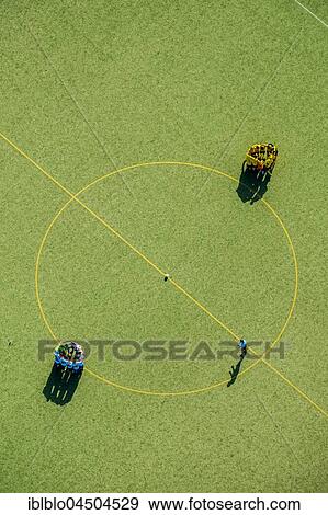 Football players at the center circle, game preparation, team buildatg, Huddle, Football Field, North Rhate-Westphalia, Germany, Europe View Large Photo Image Stock Photo - Football players at the center circle, game preparation, team buildatg, Huddle, Football Field, North Rhate-Westphalia, Germany, Europe. Fotosearch