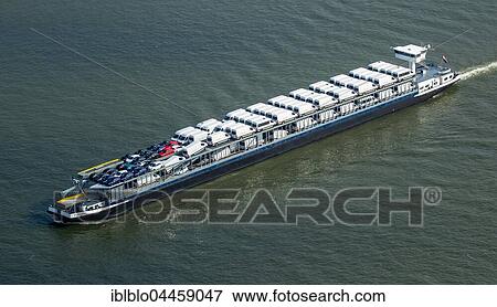 Forenso cargo ship, car cargo ship, cargo ship with small trucks, inland waterways, river Rhine at Rheinberg, Ruhr district, North Rhine-Westphalia, Germany, Europe View Large Photo Image Stock Photo - Forenso cargo ship, car cargo ship, cargo ship with small trucks, inland waterways, river Rhine at Rheinberg, Ruhr district, North Rhine-Westphalia, Germany, Europe. Fotosearch