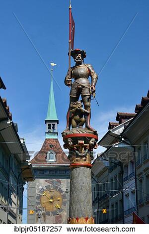 Stock Photo - Fountain figure and time bell tower, Schützenbrunnen in the Marktgasse, 1543, Bern, Canton of Bern, Switzerland, Europe. Fotosearch