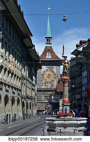 Stock Photo - Fountain figure and time bell tower, Schützenbrunnen in the Marktgasse, 1543, Bern, Canton of Bern, Switzerland, Europe. Fotosearch