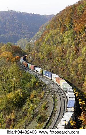 Freight train on rails, Geislinger Steige between Geislingen and Amstetten, Baden-Württemberg, Germany, Europe View Large Photo Image Stock Image - Freight train on rails, Geislinger Steige between Geislingen and Amstetten, Baden-Württemberg, Germany, Europe. Fotosearch